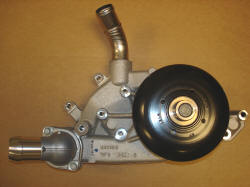 Truck water pump : Has provision for mechanical cooling fan and has the outlet perpindicular to the pulley.